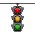 Hanging traffic lights with all three colors on.