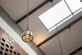 Hanging vintage ceiling yellow lamp interior at day light