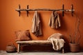 hanging wall rack and coats on bench Royalty Free Stock Photo