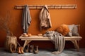 hanging wall rack and coats on bench Royalty Free Stock Photo