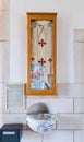 Hanging on the wall a scarf donated by Pope Joan Paul II to Monastery located on the mountain on the coast of the Sea of Galilee -