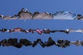 Hanging washed clothes on ropes Royalty Free Stock Photo