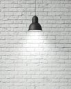 Hanging white lamp with shadow on vintage white painted brick wall, background