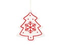 Hanging white wooden Christmas tree ornament with red snowflake isolated on a white background. Royalty Free Stock Photo
