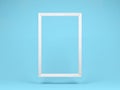 Hanging white wooden frame isolated on blue background.