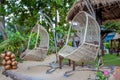 Hanging wicker chairs Royalty Free Stock Photo