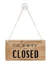 Hanging wooden sign with message SORRY WE ARE CLOSED isolated on white background with clipping path Royalty Free Stock Photo