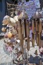 Hanging wooden wind bell. Close-up. Blurred background Royalty Free Stock Photo