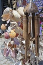 Hanging wooden wind bell. Close-up. Blurred background Royalty Free Stock Photo