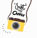 Hanging yellow camera with stylish lettering