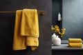 hanging yellow towel in modern bathroom