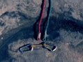 Hank sling carabiners at used red and green ropes