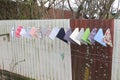 Hankies pegged onto fence wire Royalty Free Stock Photo