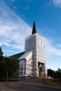 Hanko Church under renovation with scaffolding and protective sheeting around the tower Royalty Free Stock Photo