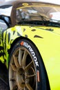 Hankook motor sport tire logo on racing car close up