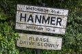 Old village road sign in Hanmer, Wales on July 10, 2021
