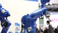 Yaskawa motoman robot arm rotating on Messe fair in Hannover, Germany