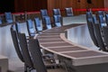 Empty row of chairs with work tables in the plenum of the Lower Saxony Parliament at the Open Day