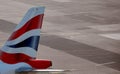 British airways logo on the tail of an aircraft getting ready to take flight from Hannover airport