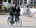 Unidentified Old Man enjoying riding a Bicycle by The Maschsee Lake in Hannover, Germany