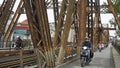 Hanoi, circa January 2020: Local motorbike driver on long bien bridge