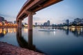 Hanoi cityscape at twilight at Hoang Cau lake, with the Cat Linh-Ha Dong elevated railroad