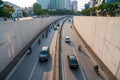 Hanoi traffic with vehicles running on Dai Co Viet crossing underpass tunnel exit Royalty Free Stock Photo