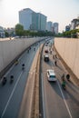 Hanoi traffic with vehicles running on Dai Co Viet crossing underpass tunnel exit Royalty Free Stock Photo