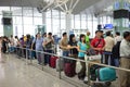Hanoi, Vietnam - Apr 29, 2016: Queue of Asian people in line waiting at boarding gate in Noi Bai airport