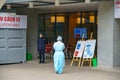 Woman doctor with safety wear at Viet-Phap hospital against covid-19 coronavirus pandemic