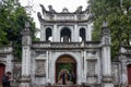 Hanoi, Vietnam - April 16. 2018: People enter the Van Mieau Mon temple in Hanoi.