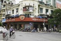 Hanoi, Vietnam - Aug 30, 2015: Front exterior view of Highlands Coffee on Le Duan street, with vehicles transporting on street