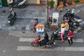 Street food vendors selling bread rolls on sidestreet in Hanoi