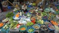 Hanoi, vietnam, circa january 2020: local vendors selling their products on an streetmarket