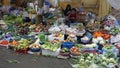 Hanoi, vietnam, circa january 2020: local vendors selling their products on an streetmarket