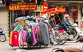 HANOI, VIETNAM - DECEMBER 16, 2016: A cart with things on a city street. Sale of things. Copy space for text.