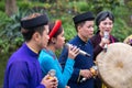 Hanoi, Vietnam - Feb 9, 2017: Folk singers singing Bac Ninh duets, folk singing on the boat in La Phu village, Hoai Duc. Intangibl Royalty Free Stock Photo