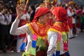 Hanoi, Vietnam - Feb 5, 2017: Men with women dress performing ancient dance called Con Di Danh Bong - Prostitutes beat the drum at