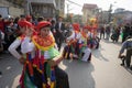 Hanoi, Vietnam - Feb 5, 2017: Men with women dress performing ancient dance called Con Di Danh Bong - Prostitutes beat the drum at