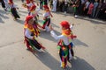 Hanoi, Vietnam - Feb 5, 2017: Men with women dress performing ancient dance called Con Di Danh Bong - Prostitutes beat the drum at