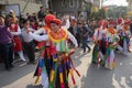 Hanoi, Vietnam - Feb 5, 2017: Men with women dress performing ancient dance called Con Di Danh Bong - Prostitutes beat the drum at