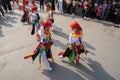 Hanoi, Vietnam - Feb 5, 2017: Men with women dress performing ancient dance called Con Di Danh Bong - Prostitutes beat the drum at