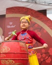 Hanoi, Vietnam - Feb 7, 2015: School pupil perform a drum show on stage at Vietnamese lunar new year festival organized at Vinscho