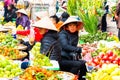 Hanoi, Vietnam - Feb 13, 2018: Street sellers of Hanoi city sell flowers or other tools needed at home on flower market in the Royalty Free Stock Photo