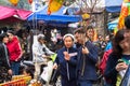 Hanoi, Vietnam - Jan 26, 2017: A mother and her son take a walk buying decoration and flower for Vietnamese lunar new year on Hang