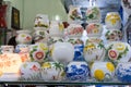 Hanoi, Vietnam - Jan 25, 2015: Pottery products on a shop in Bat Trang ancient ceramic village. Bat Trang village is the oldest an Royalty Free Stock Photo