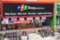 HANOI, VIETNAM - JUL 12, 2014: Front view of a mobile phone store of FPT Telecom in Hanoi capital. FPT is one of the biggest techn