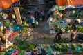 Hanoi, Vietnam - July 23, 2016: Aerial view of vegetable stalls by Long Bien fruit market, with early morning sunlight.