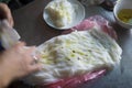 Hanoi, Vietnam - July 26, 2015: Banh Cuon name Rice noodle roll or rolled cake, is made from rice batter filled with mushroom, por