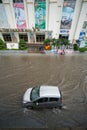 Hanoi, Vietnam - July 17, 2017: Traffic on flooded Minh Khai street after heavy rain with cars, motorcycles crossing deep water